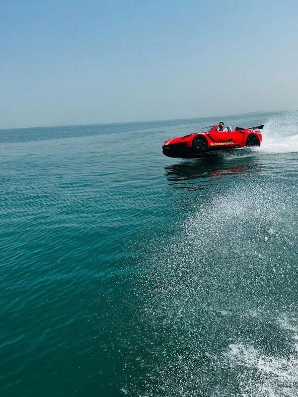 Jet Car Dubai — gold Jet Car on the water in Dubai Marina — photo 7